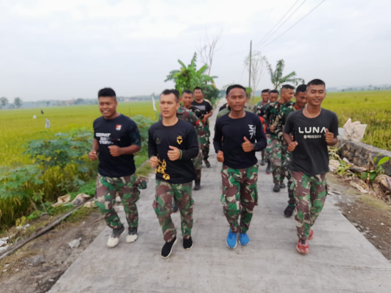 Bina Fisik, Anggota satgas TMMD lari pagi di jalan baru