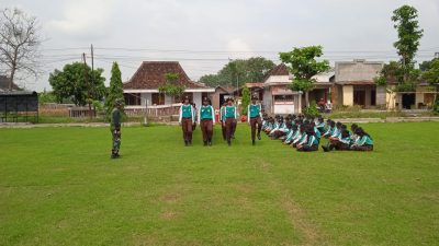 Koramil Miri Ajarkan Tata Upacara Sekolah di SMKN