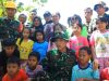 Keceriaan Anak-Anak Warnai Kehadiran Dansatgas TMMD di Desa Gadungsari