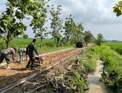Berpacu dengan Cuaca, Satgas TMMD Kebut Pengecoran Jalan di Desa Puro