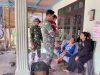 Rindu Anak Anggota Satgas TMMD Bermain Bersama Anak- Anak